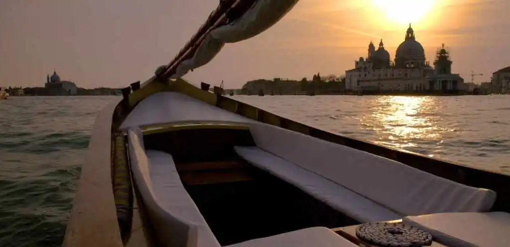 Romantic boat ride at sunset in Venice